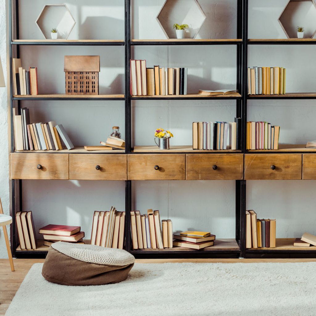 interior of living room with wooden furniture and books